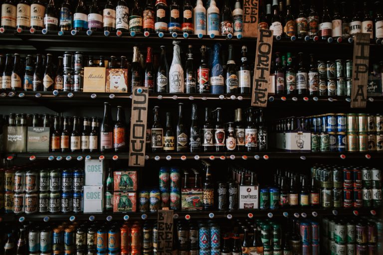 Shelves full of craft beer bottles