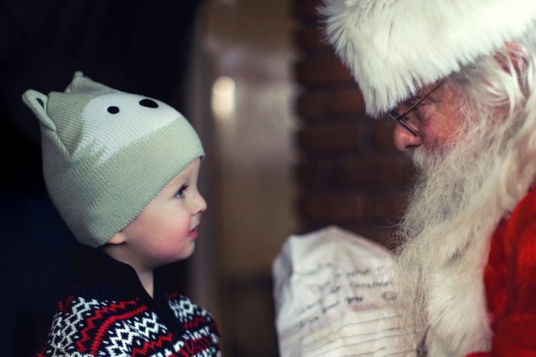 boy talks to santa