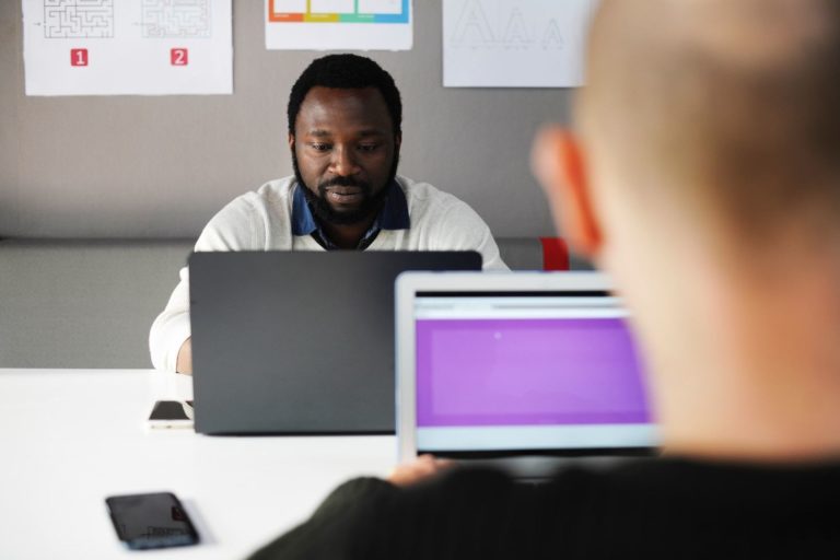people at work in office