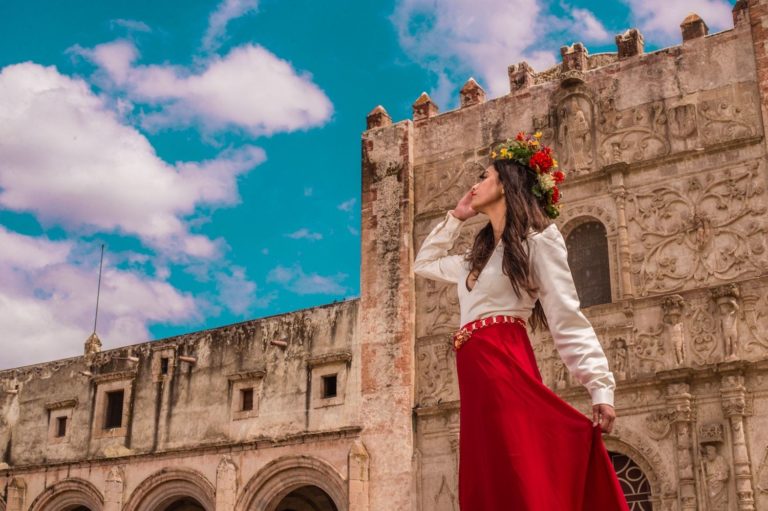 Woman in front of palace