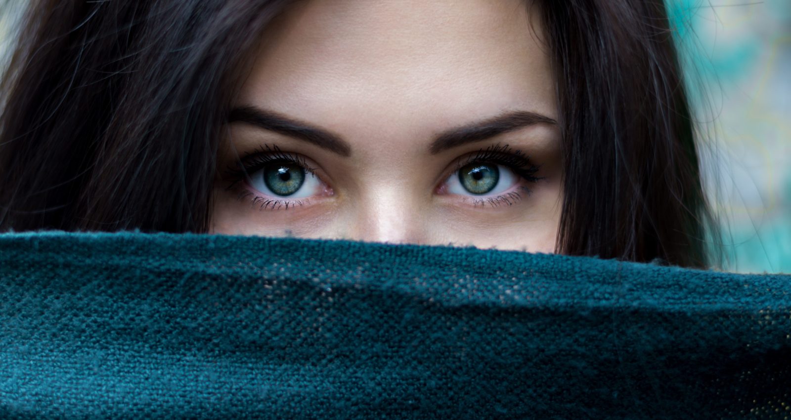 Woman's face partially covered