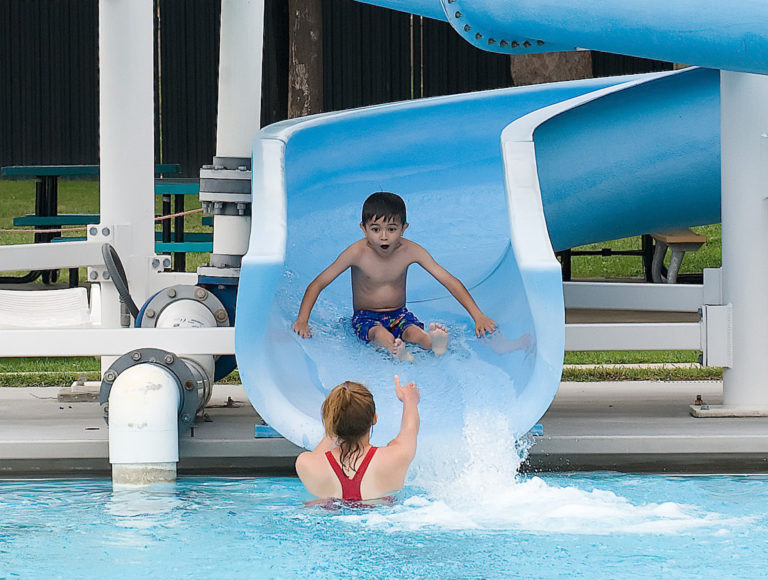 Child on water slide