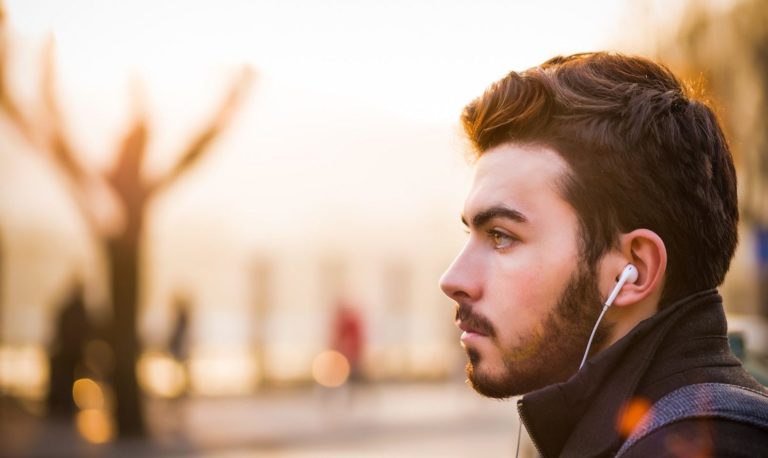 A man listening to a podcast