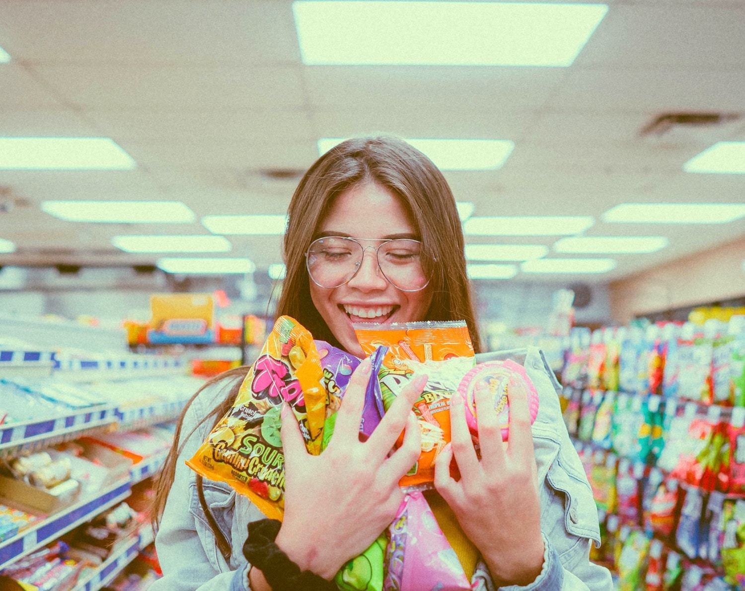 Woman with candy in store