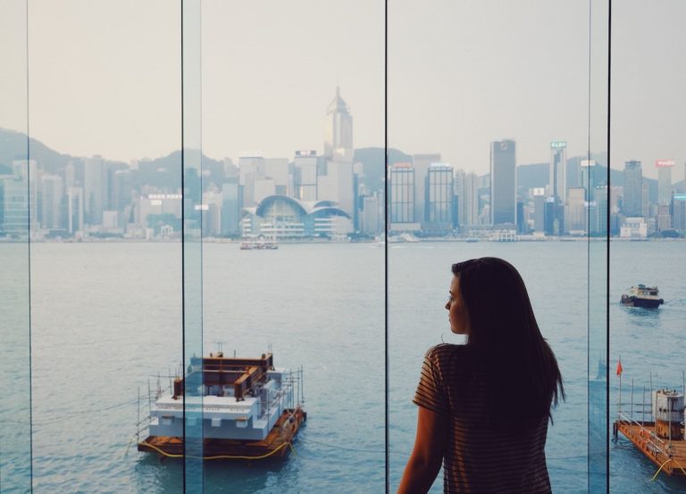 Woman looking at view of Hong Kong