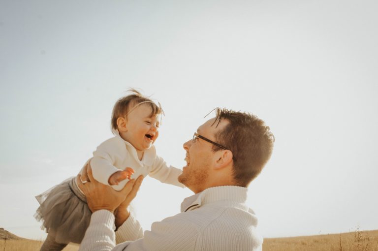 father and daughter outside
