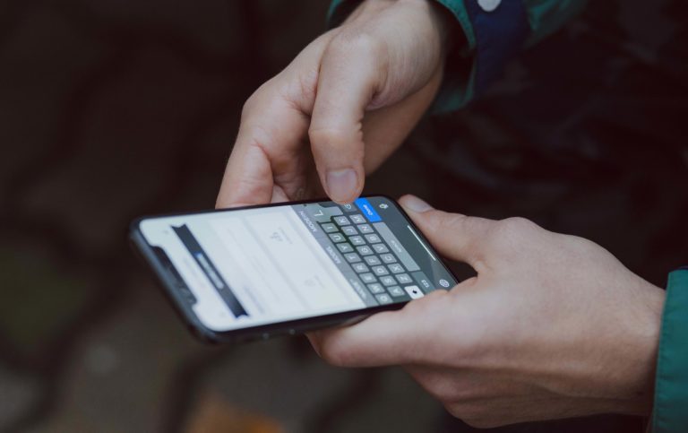 hand holding smartphone