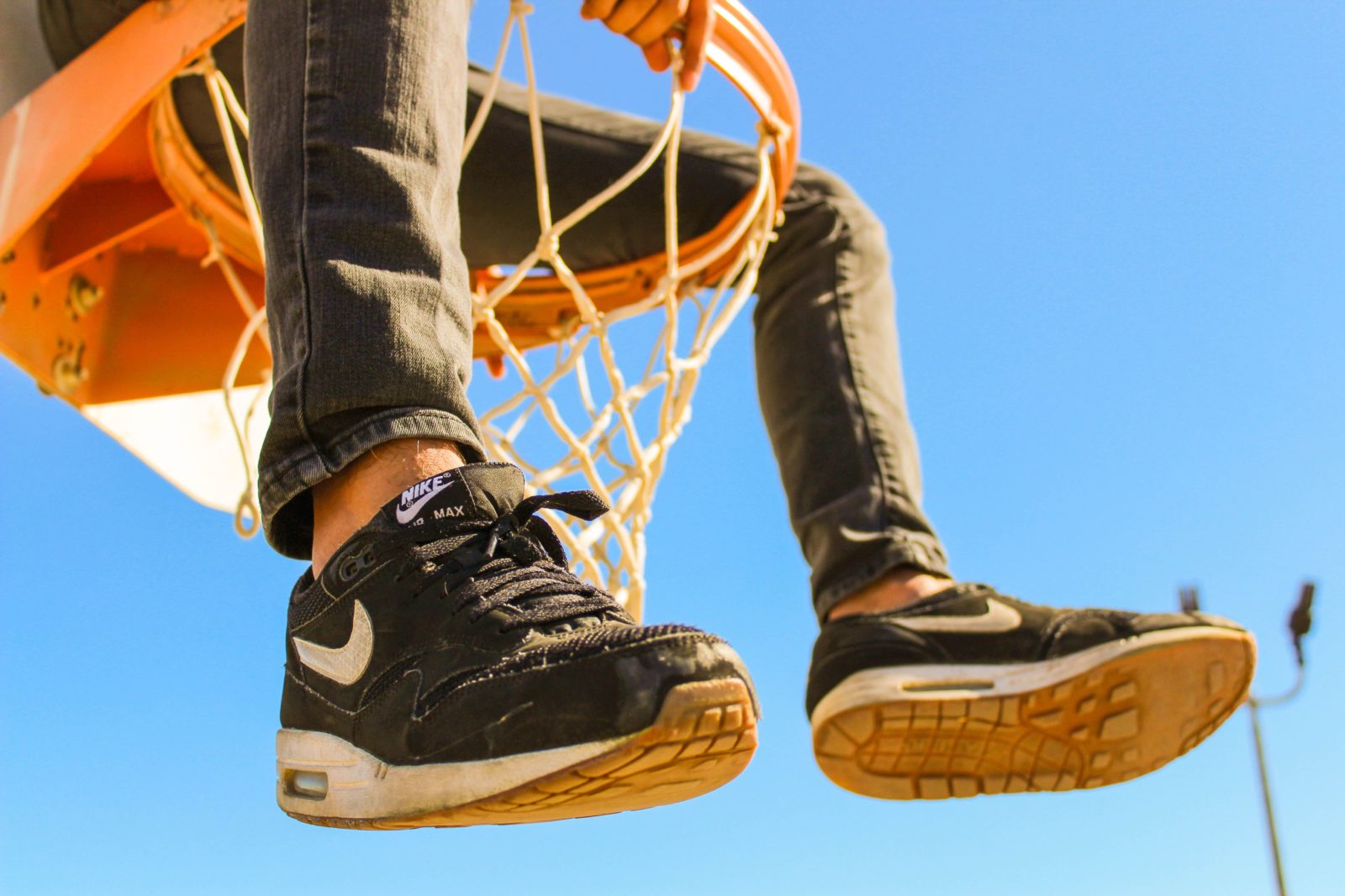 nike sneakers and basketball hoop