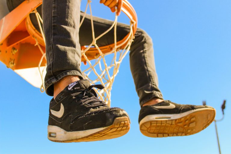 nike sneakers and basketball hoop