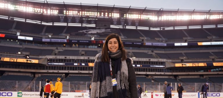 Andi Perelman, director of new media for the Pittsburgh Penguins poses on the ice.