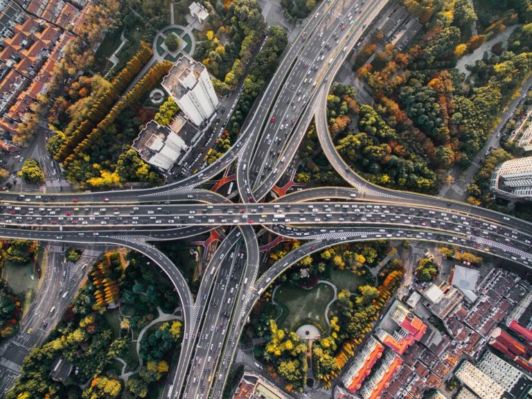 Streets intertwine on a highway overpass.