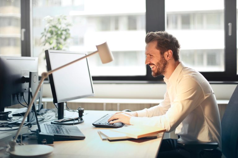 A man engages with an email marketing newsletter in 2019.