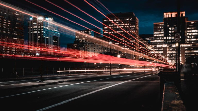 Time-lapse image of cars on a city highway