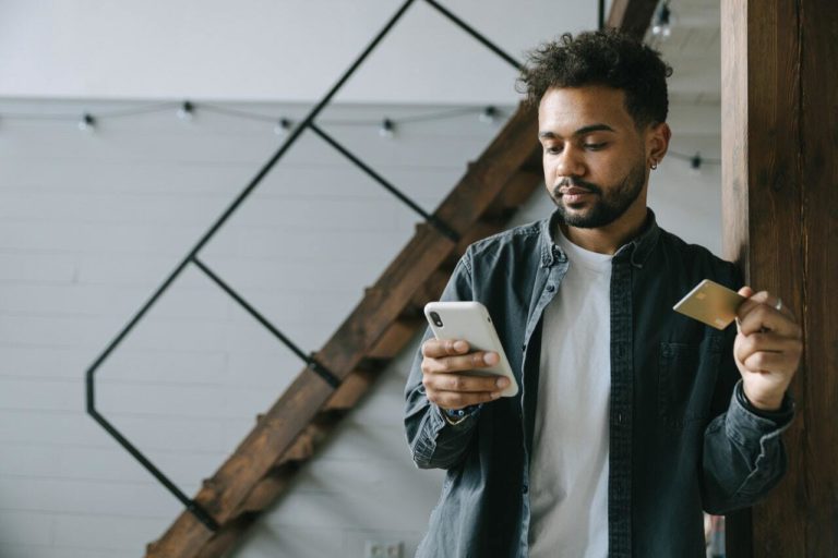 man purchasing product online