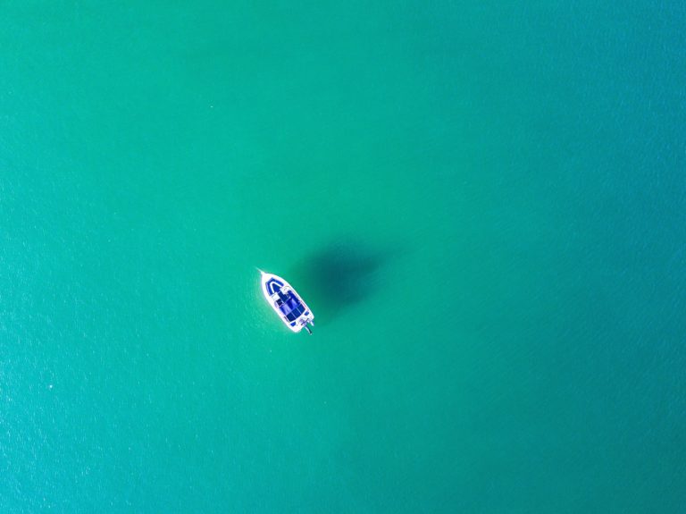 boat drifting in ocean